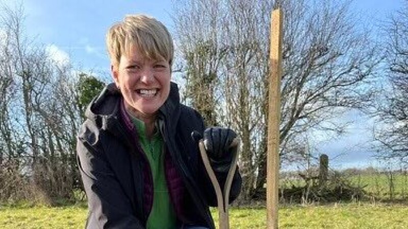 Councillor Paula Widdowson planting a tree