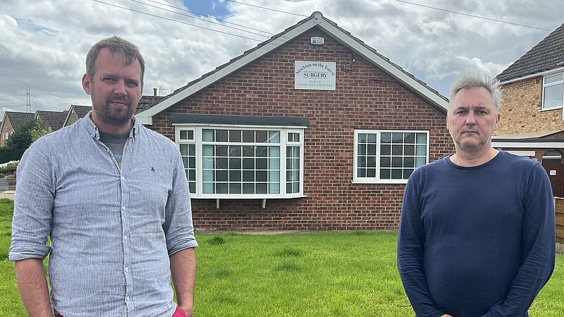 Councillors Andrew Hollyer and Paul Healey outside the Stockton-on-the-Forest GP surgery