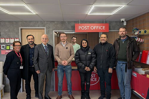  Photo of Lib Dem Cllrs Andrew Hollyer and Ian Cuthbertson with the Post Office team and Luke Charters MP
