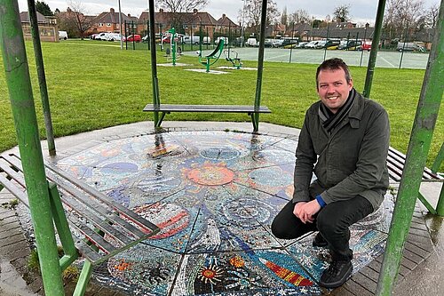 Cllr Hollyer at the mosaic