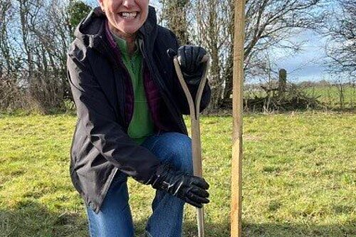 Councillor Paula Widdowson planting a tree