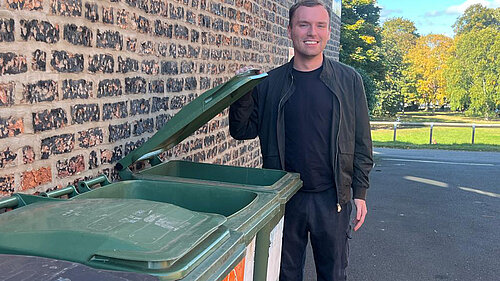 Luke Draper with bins