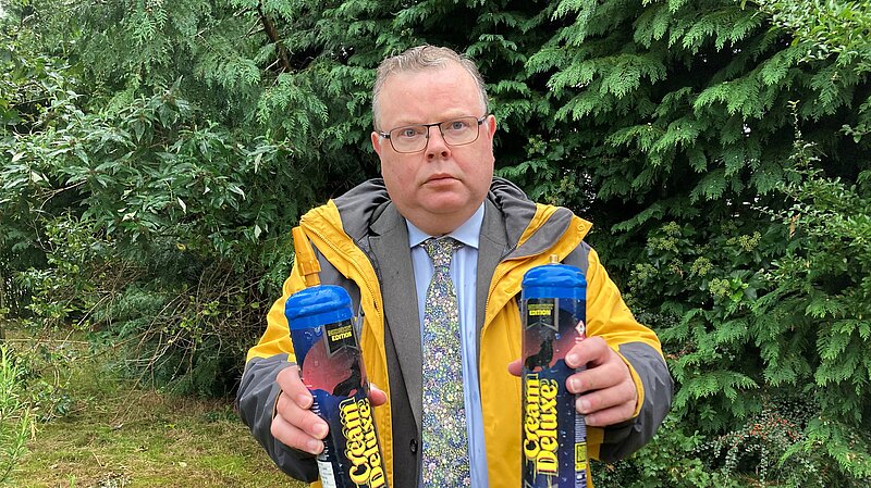 Councillor Andrew Waller with two Nitrous Oxide cannisters